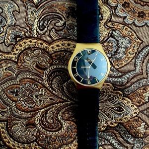Black and Gold Skagen Watch